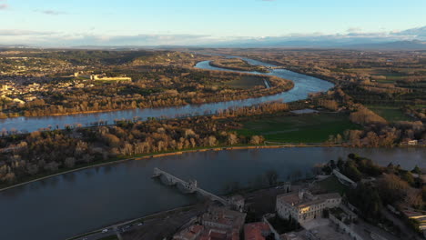 Aerial-view-of-the-Pont-d'Avignon-Rhone-river-beautiful-sunrise-fluvial-Island